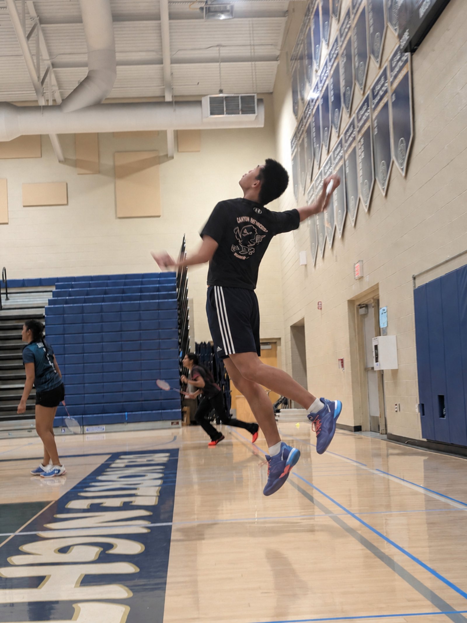 Mid-air overhead shot in the CCA gym.